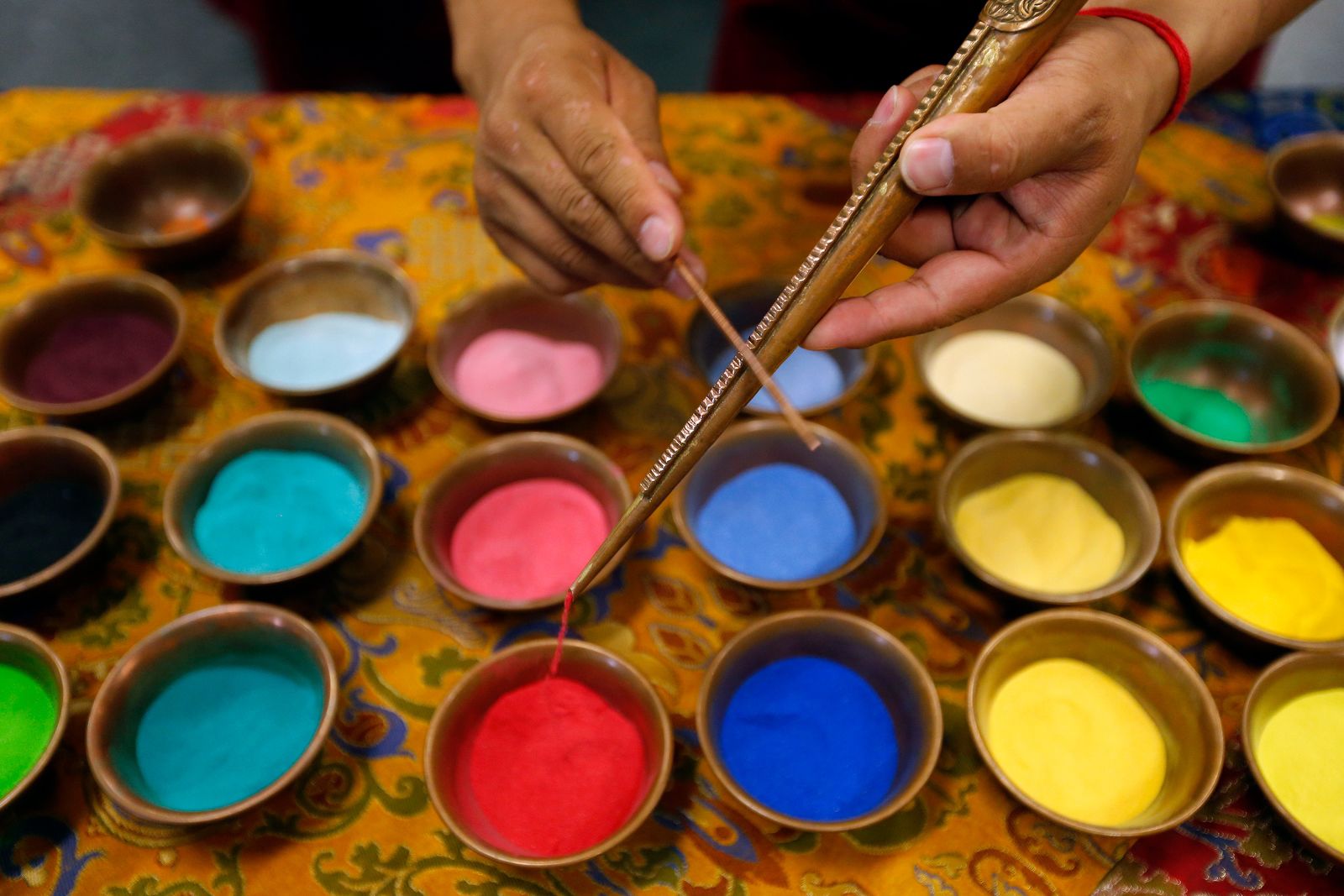 Painstakingly created, then swept away: Tibetan monks' sand mandala at Lily Dale